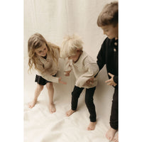 L by Ladida Oat Boucle Polo