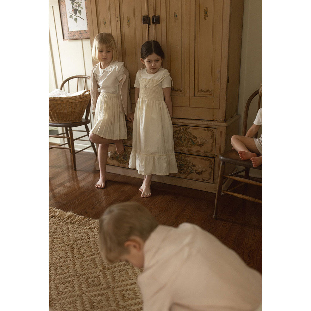 L by Ladida Cream Pleated Skirt