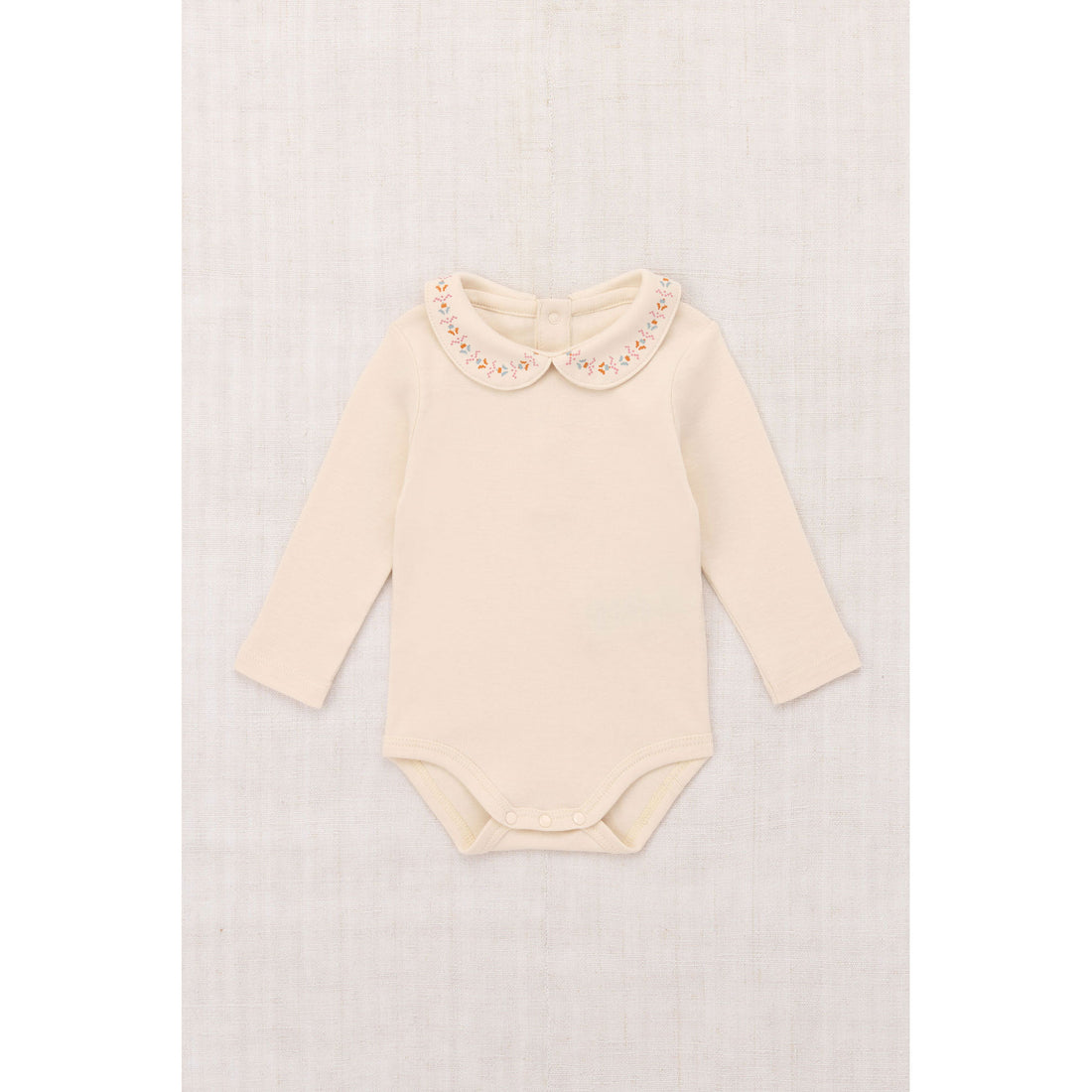 Misha and Puff String Baby Millefleurs Petit Collar Onesie