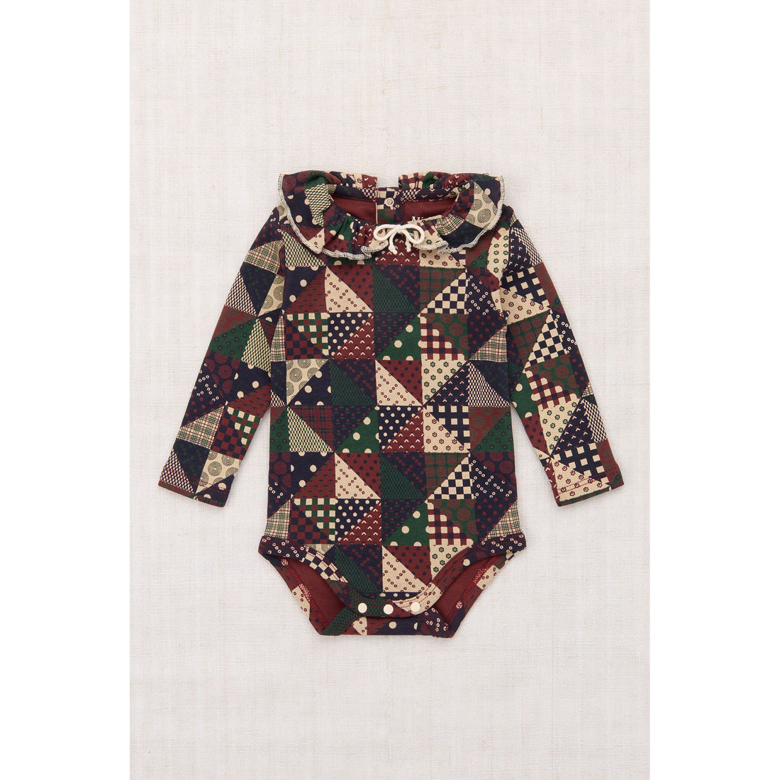 Misha and Puff  Madder Root Patchwork Pattie Onesie