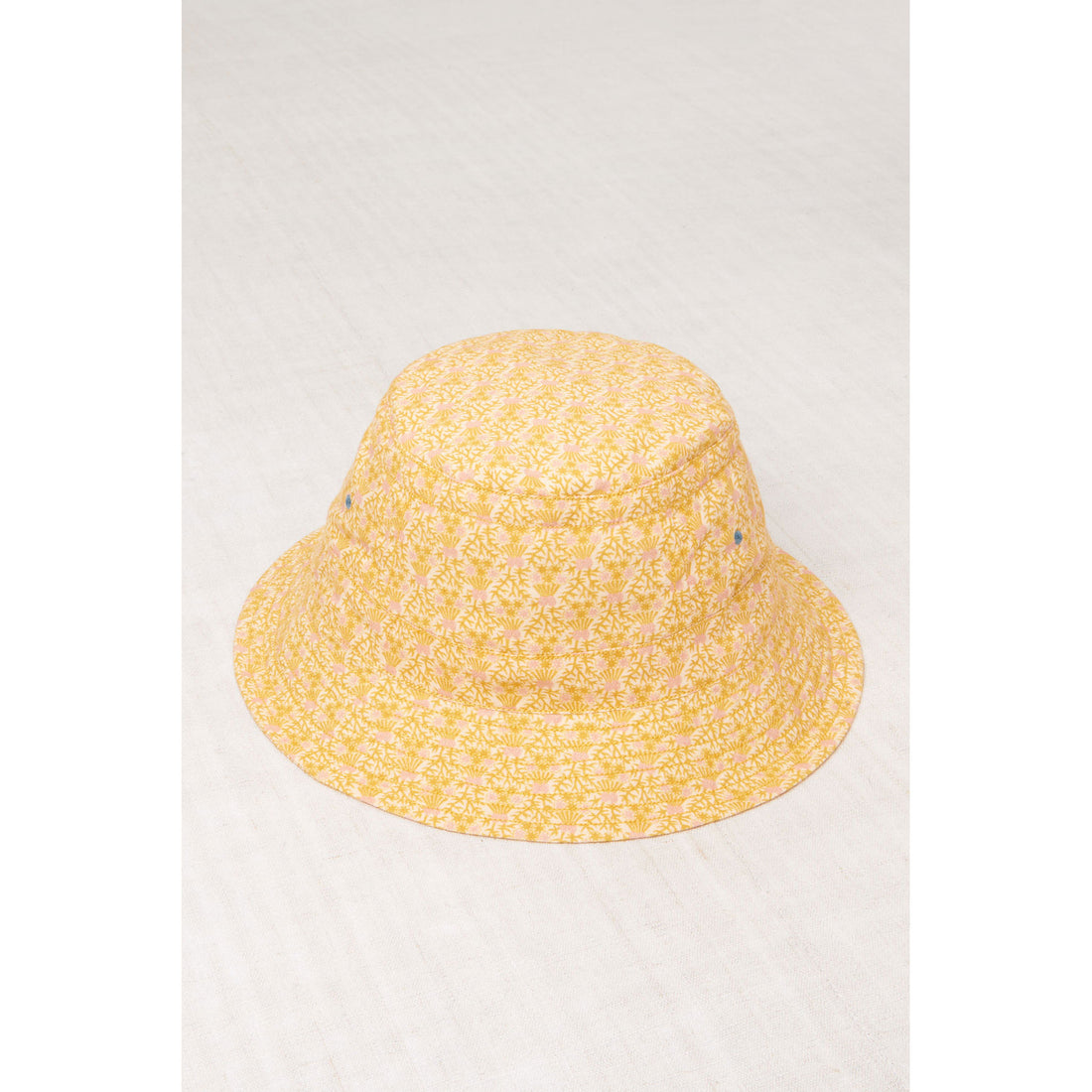 Misha and Puff Golden Orche Radish Root Bucket Hat