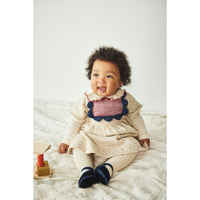 Misha and Puff  String Pattie Onesie