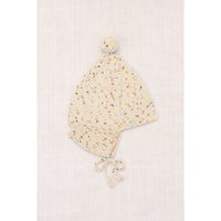 Misha and Puff Snowglobe Confetti Pointy Peak Hat