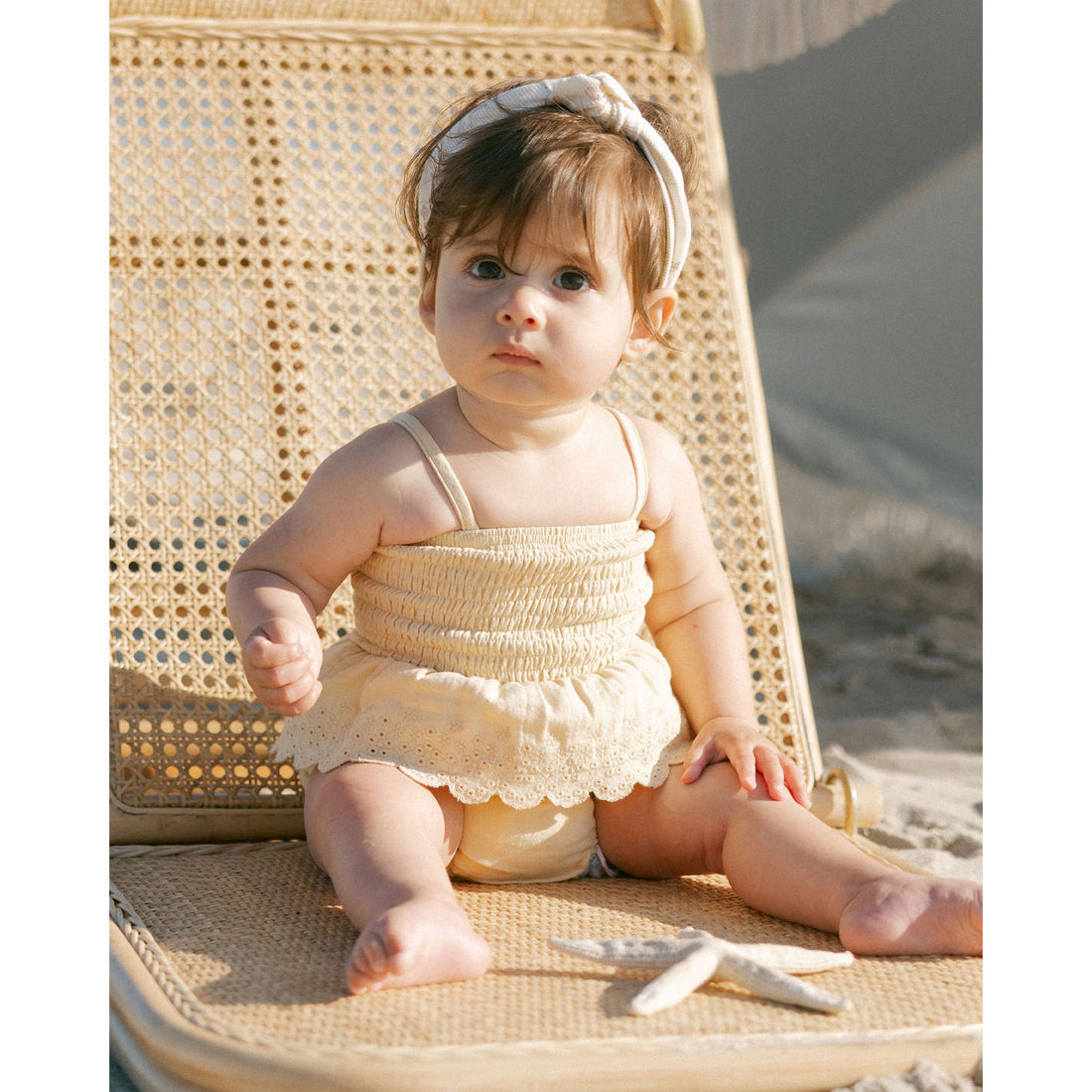 Quincy Mae Yellow Smocked Skirted Romper