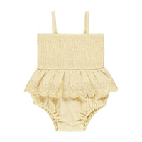 Quincy Mae Yellow Smocked Skirted Romper