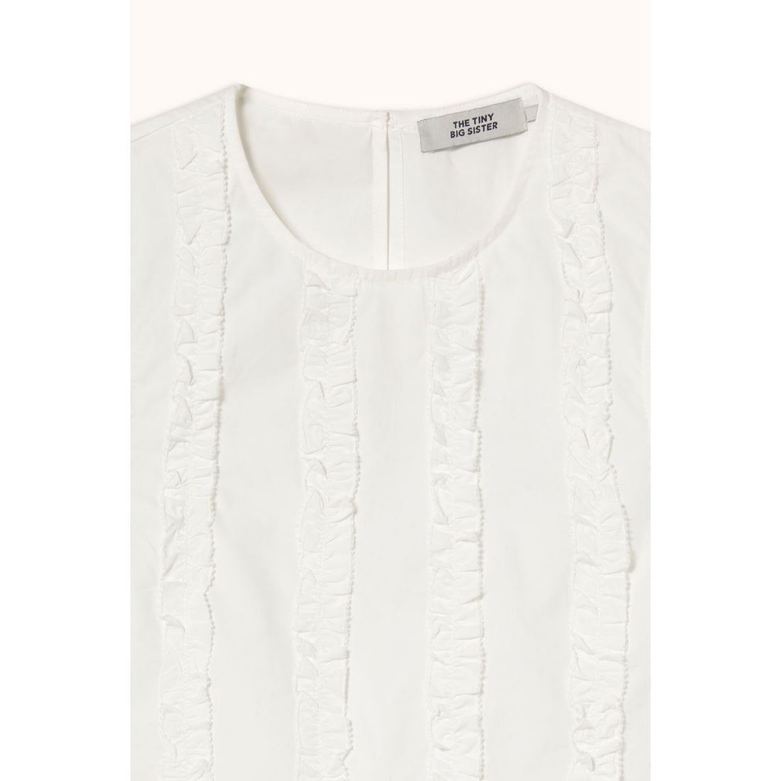 The Tiny Big Sister Off White Frills Top