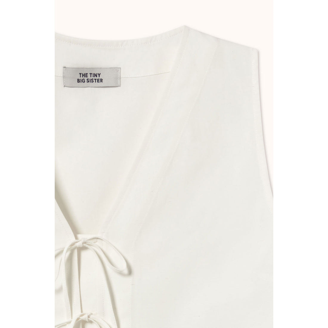The Tiny Big Sister Off-White Stripes Vest