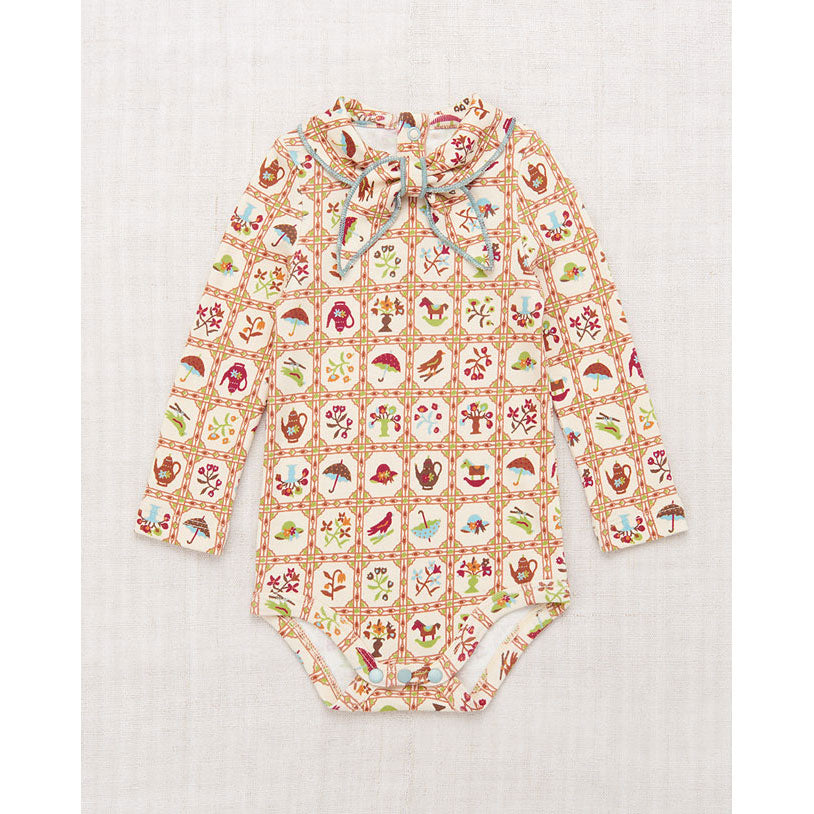 Misha and Puff  String Trellis Scout Onesie