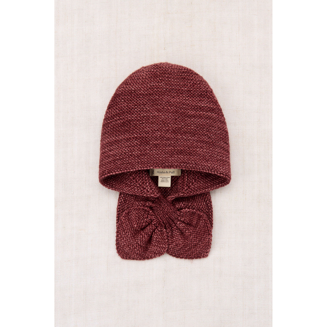 Misha and Puff Madder Root Sledding Hood