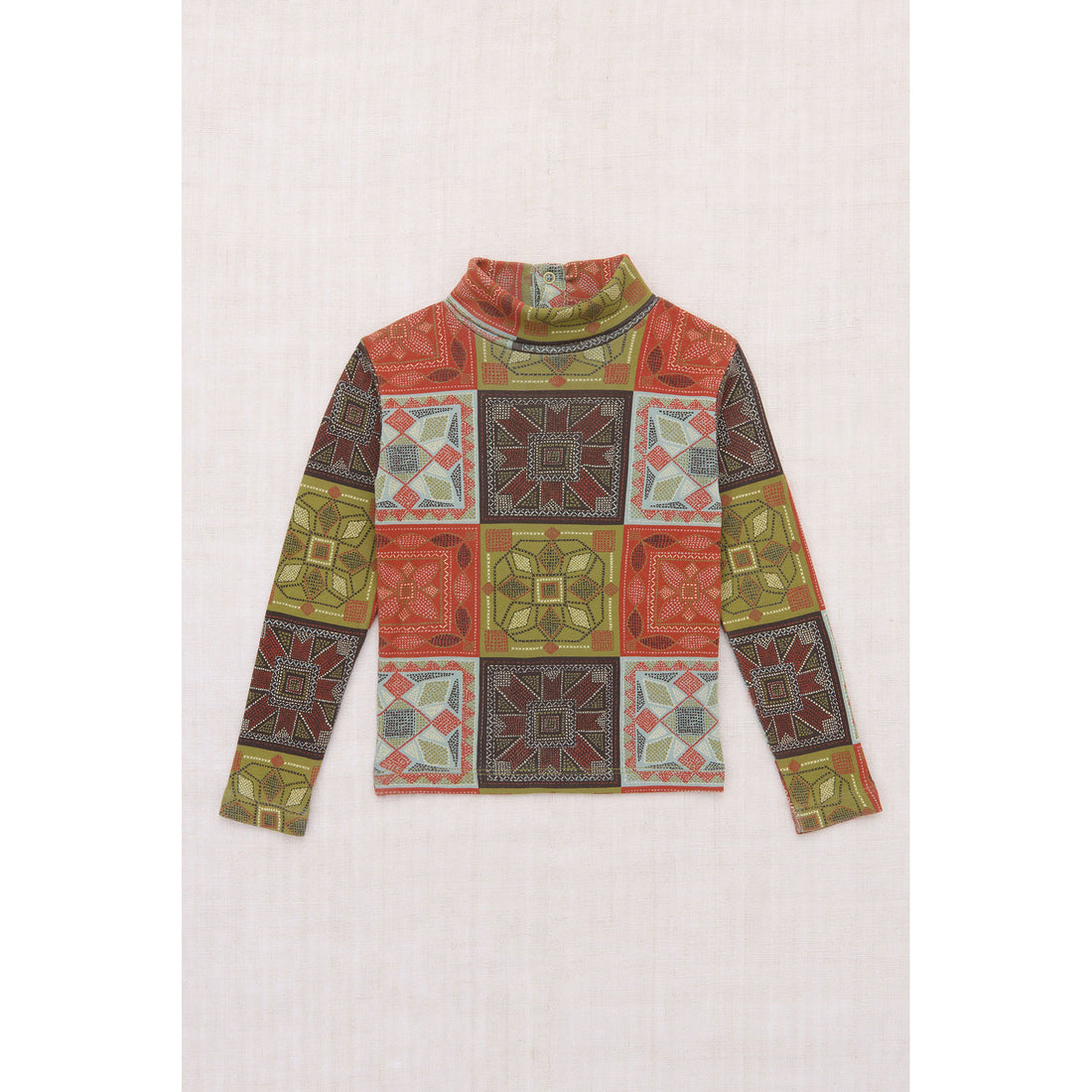 Misha and Puff Chili Spice Cross Stitch Turtleneck