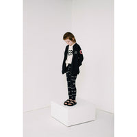 Beau Loves Black Journal Text Allover Slim Pants