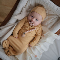 Mushie Ribbed Baby Bonnet - Mustard Melange