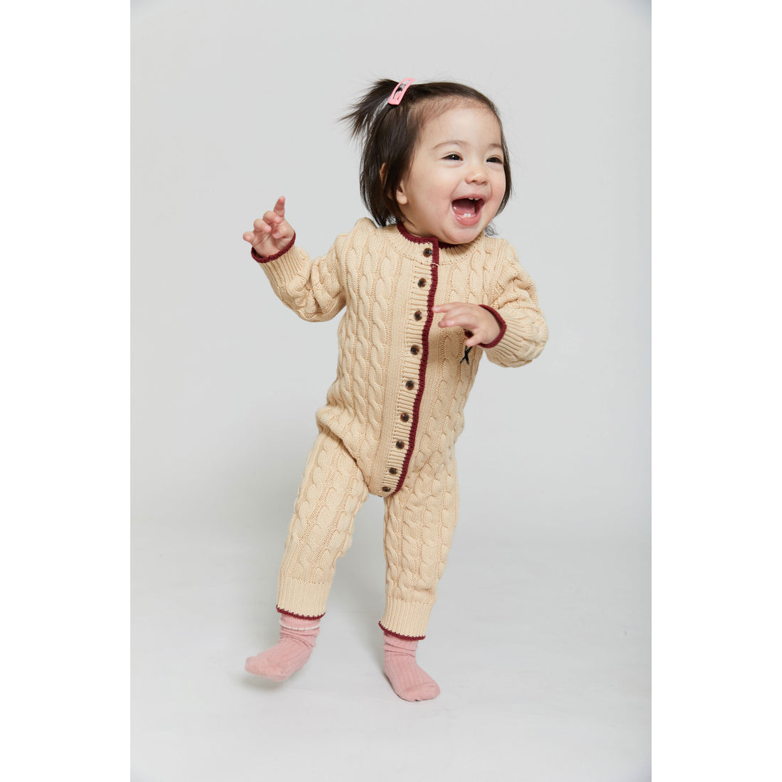 Hey Kid Beige Knit Onesie with Red Trim Detail