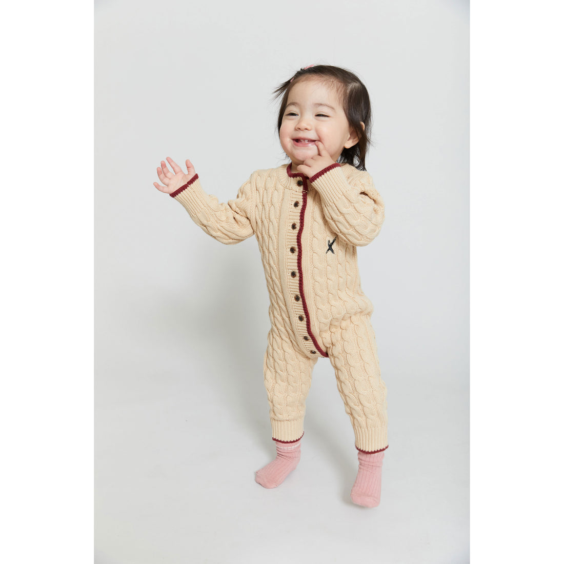 Hey Kid Beige Knit Onesie with Red Trim Detail