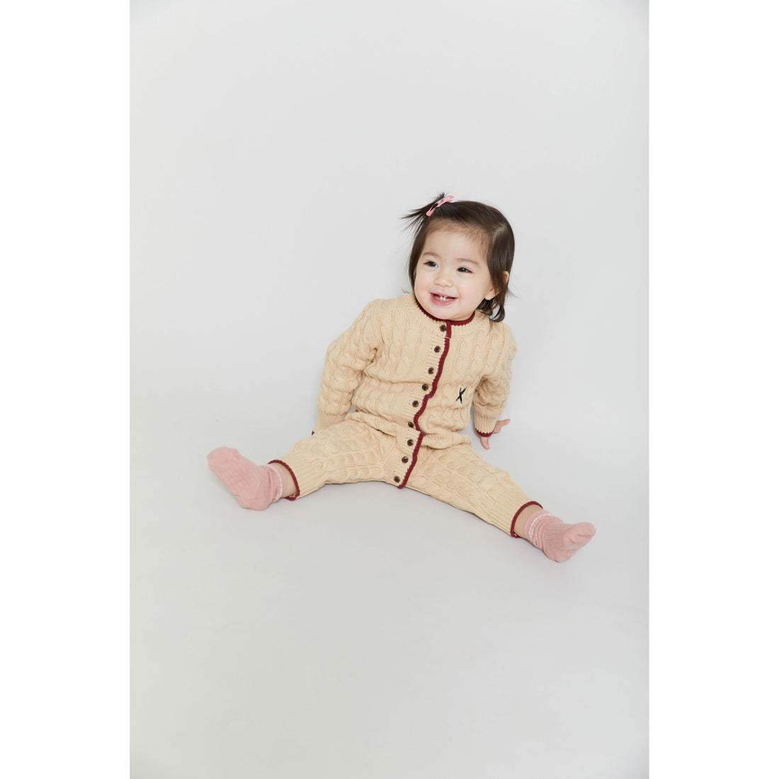 Hey Kid Beige Knit Onesie with Red Trim Detail