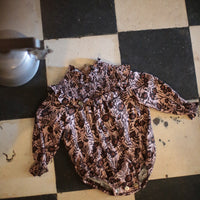 By Nine Pilar Romper