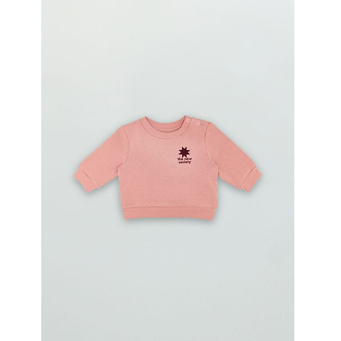 The New Society Petal Star Logo Baby Sweater